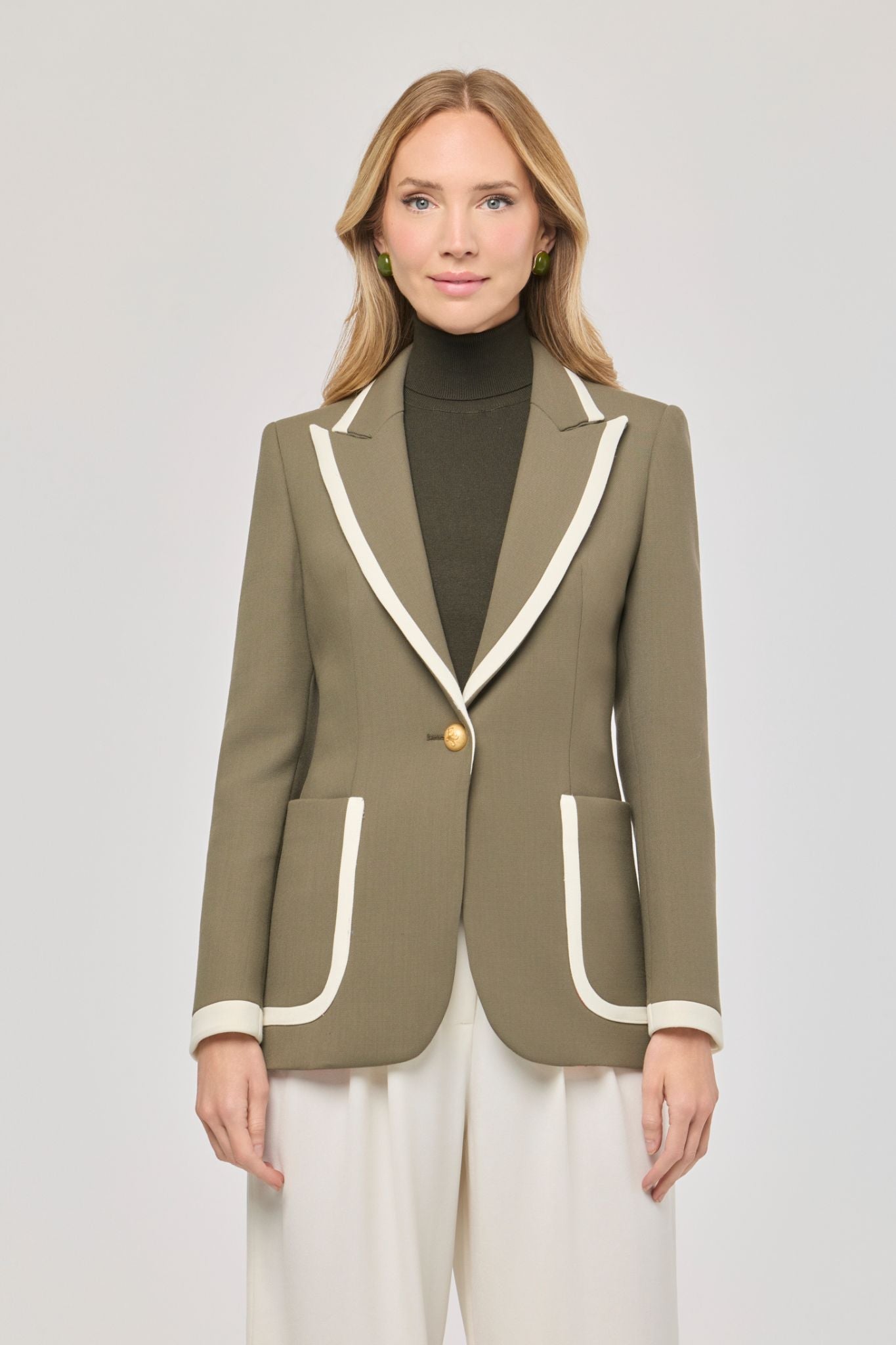 Blazer verde con ribetes en contraste Laurent de The Extreme Collection de color verde con ribetes blancos.