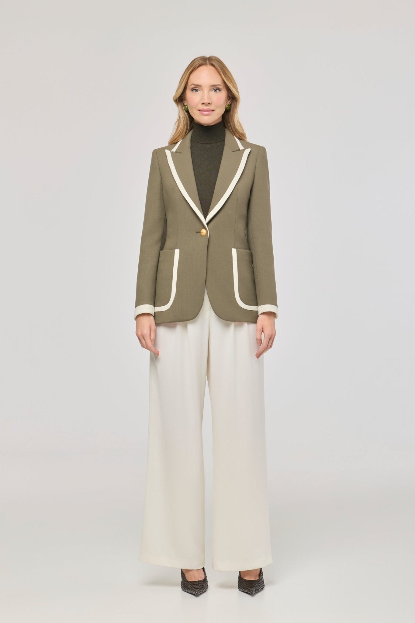 Blazer verde con ribetes en contraste Laurent de The Extreme Collection de color verde con ribetes blancos.
