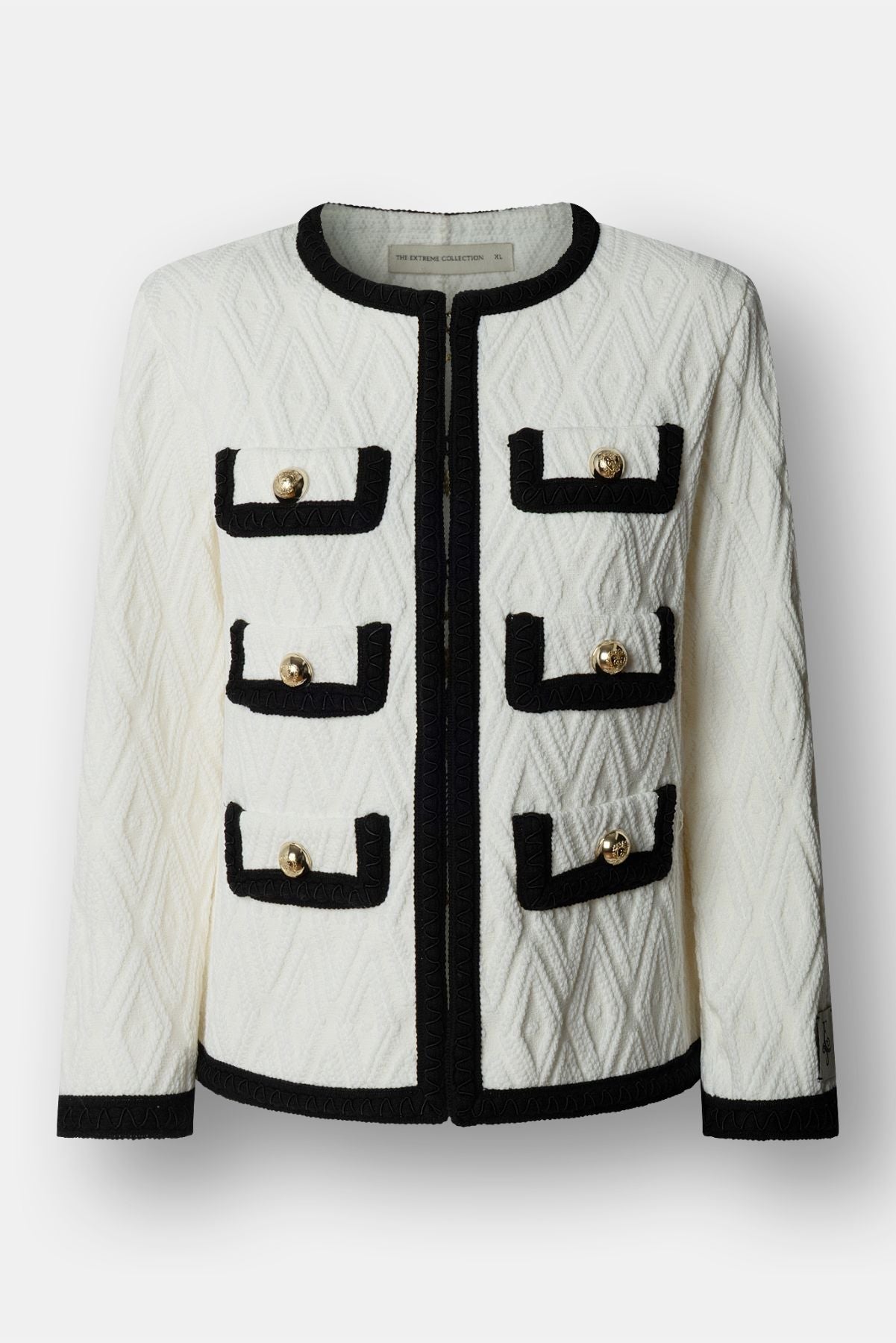 Chaqueta bicolor para mujer modelo Bianca en blanco con vivos negros.