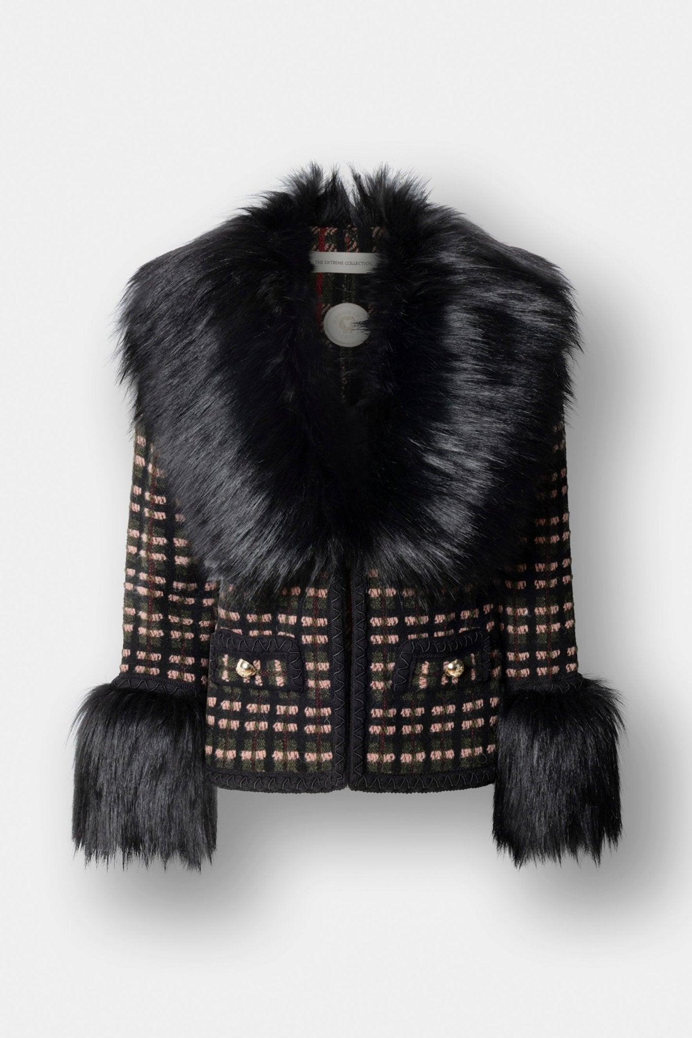 Chaqueta corta con aplicaciones de pelo ecológico Angele, con base de tejido estructurado multicolor y detalles de pelo en cuello y puños.