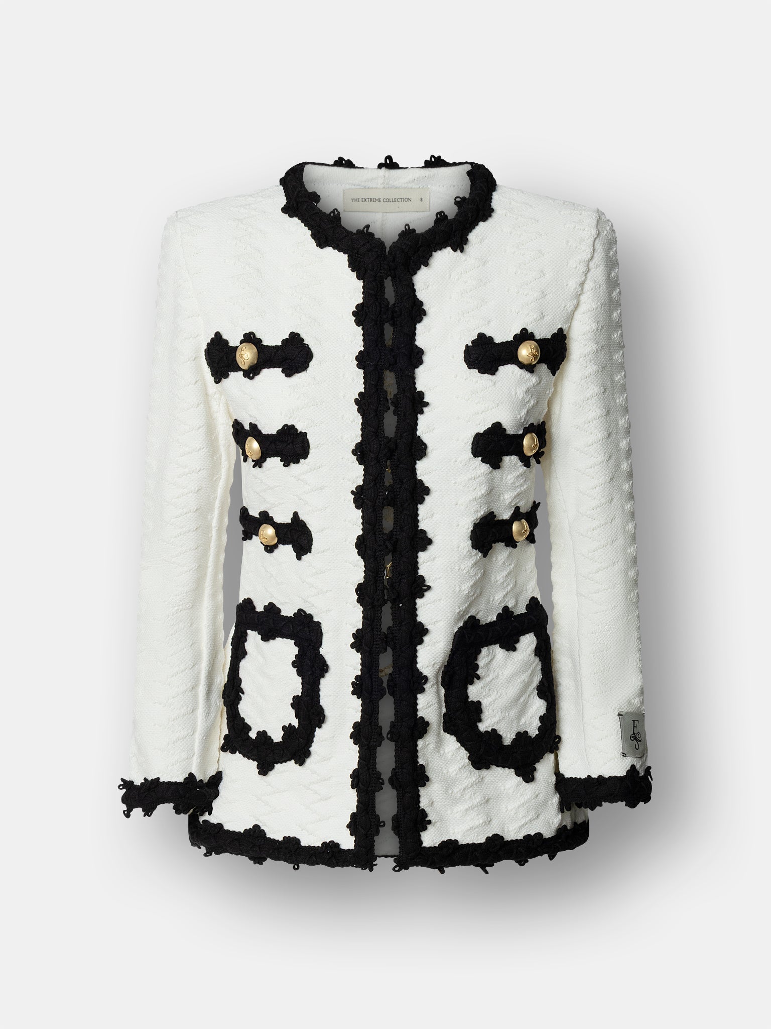 Chaqueta de punto para mujer modelo Oliver en blanco con vivos y bolsillos en negro.